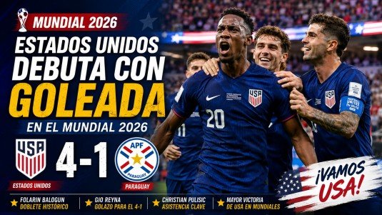 Jugadores de Estados Unidos celebran una contundente victoria por 4-1 sobre Paraguay en el Mundial 2026. Folarin Balogun lidera la celebración tras marcar un doblete histórico, mientras el marcador destaca el triunfo de EE. UU. en su debut mundialista ante una multitud en un estadio lleno.